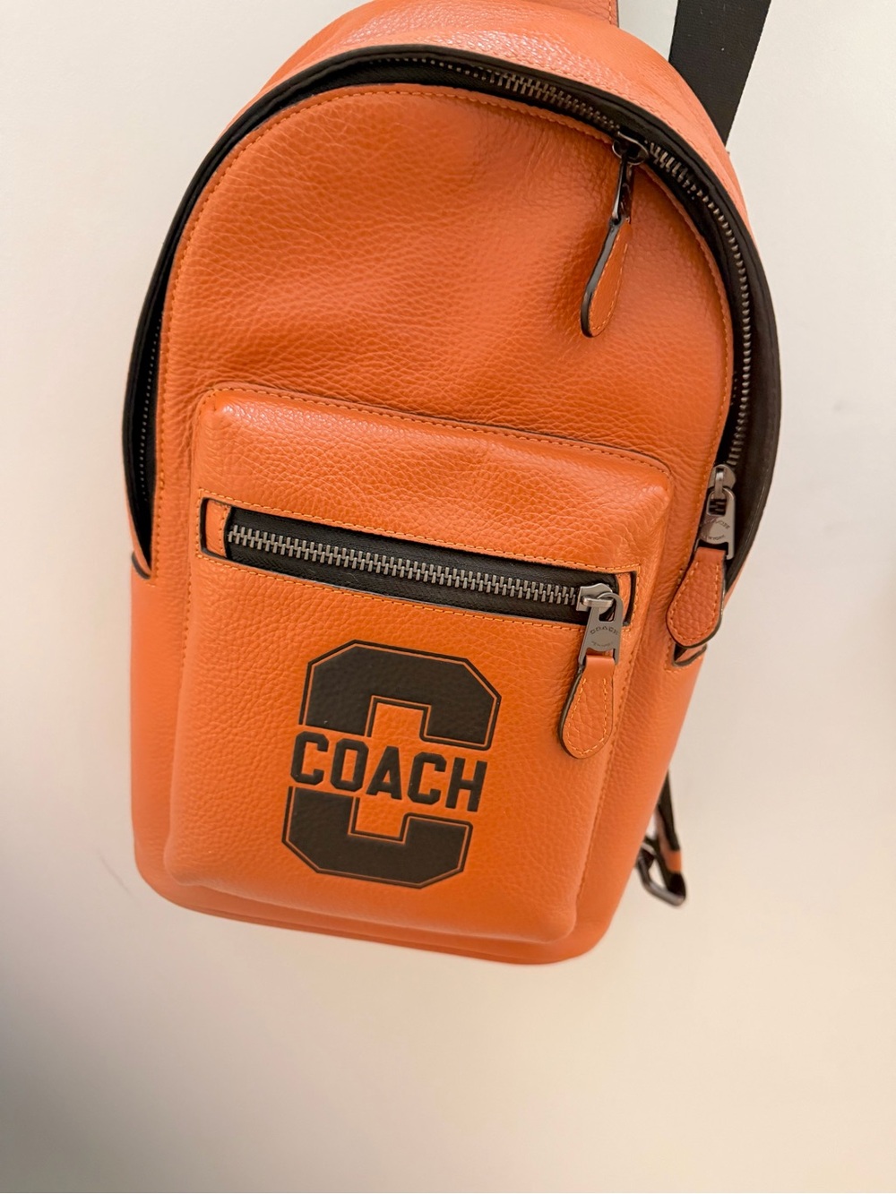 Coach Orange Leather Sling Bag with Black Logo